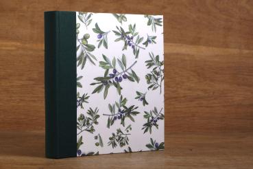 Classic photo album with olives as cover paper